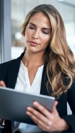 woman looking at the tablet